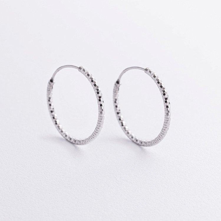 Серьги - кольца в серебре (2.4 см) 122960 от ювелирного магазина Оникс