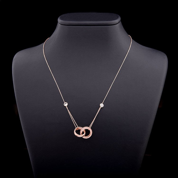 Золотое колье "Два обручальных кольца" с фианитами кол00731 от ювелирного магазина Оникс