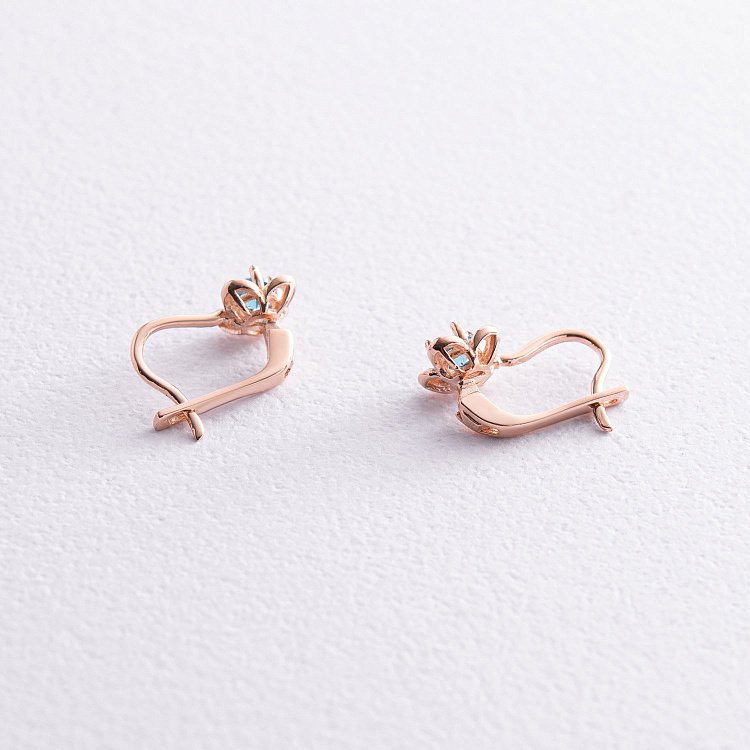 Дитячі золоті сережки "Квіточки" (блакитні фіаніти) с05767 від ювелірного магазину Онікс - 2