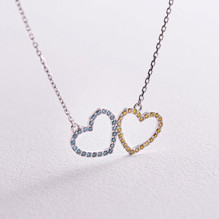 Золотое колье "Сердечки" с голубыми и желтыми бриллиантами 727151121 от ювелирного магазина Оникс