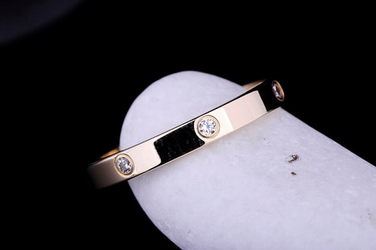 Каблучка з жовтого золота з фіанітами обр00159 від ювелірного магазину Онікс - 1