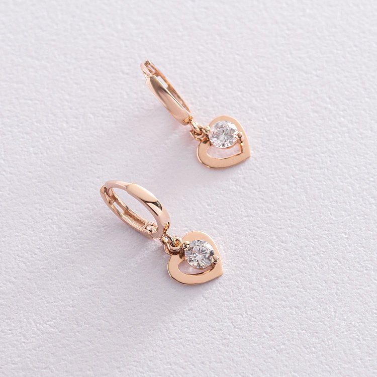 Золотые серьги "Сердечки" с фианитами с07346 от ювелирного магазина Оникс