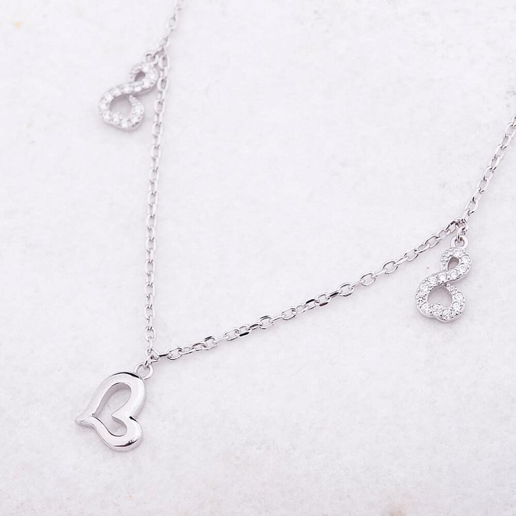 Срібний браслет на ногу "Нескінченність і серця" з фіанітами 14912 від ювелірного магазину Онікс - 3