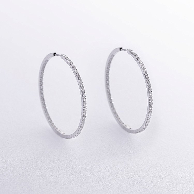 Золоті сережки - кільця з діамантами 313231121 від ювелірного магазину Онікс