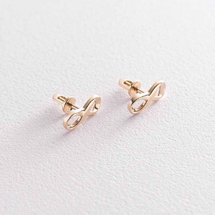 Серьги - пусеты "Бесконечность" в желтом золоте с07108 от ювелирного магазина Оникс - 2