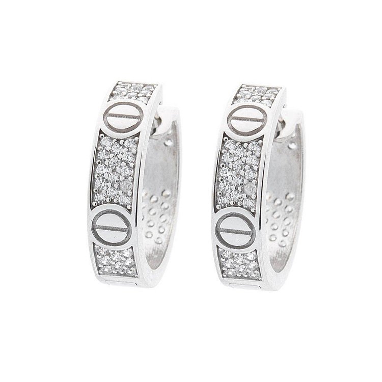 Золоті сережки-кільця з фіанітами с05389 від ювелірного магазину Онікс