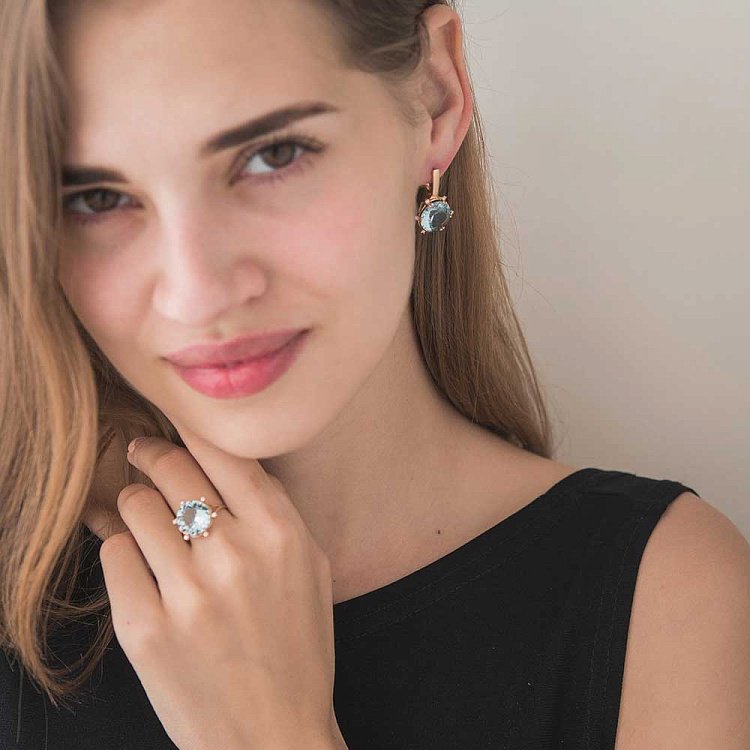 Золотые серьги с голубым топазом 1в91014 от ювелирного магазина Оникс