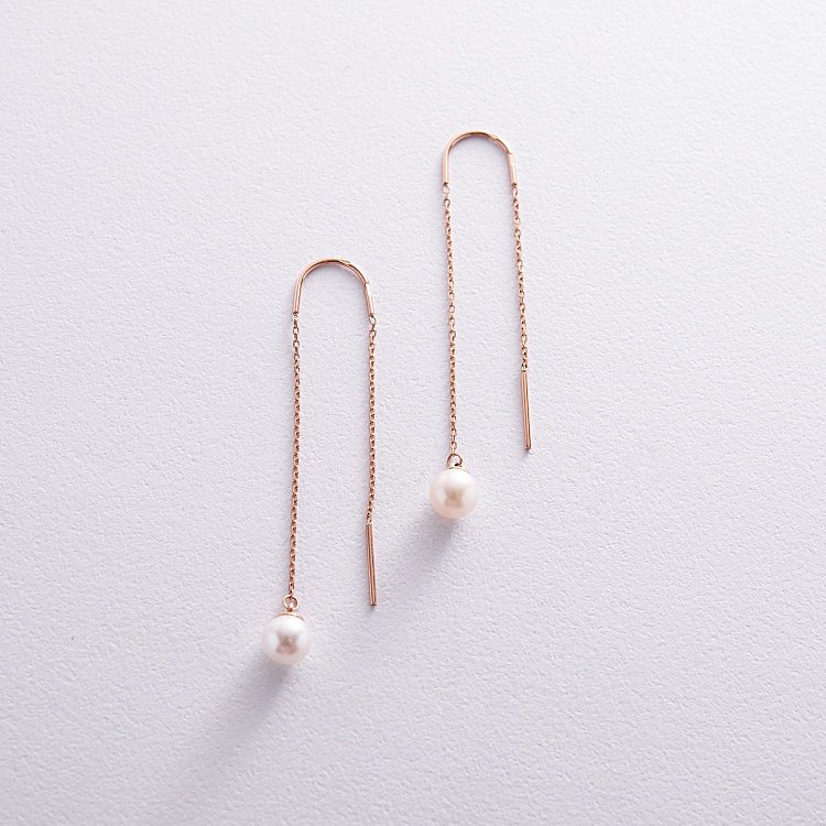 Сережки - протяжки з перлами (червоне золото) с08268 від ювелірного магазину Онікс