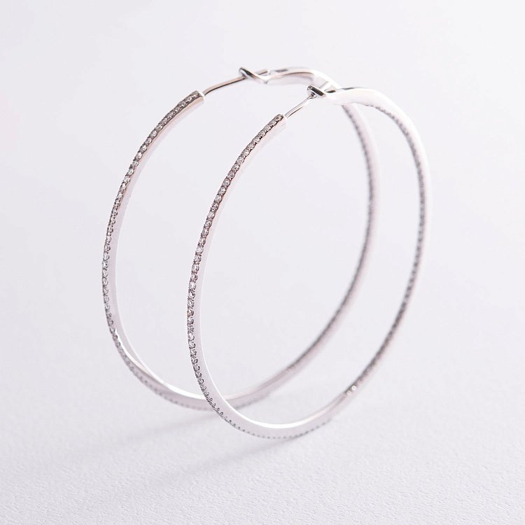 Золоті сережки - кільця з діамантами с801 від ювелірного магазину Онікс