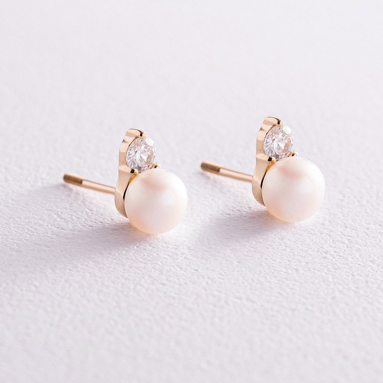 Сережки - пусети з перлами і фіанітами (жовте золото) с08033 від ювелірного магазину Онікс