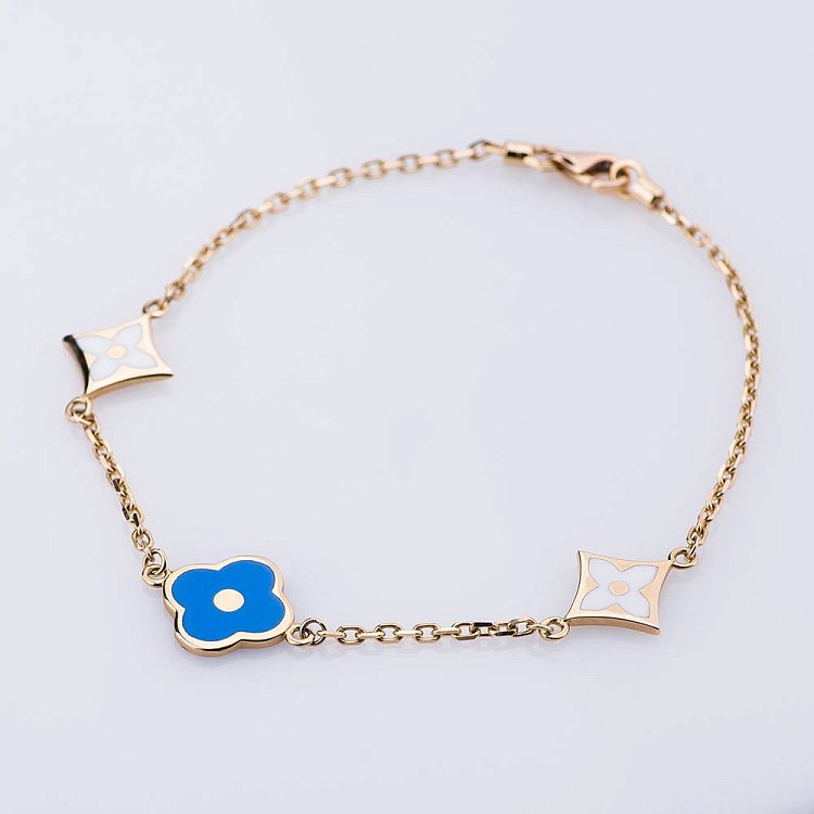 Золотой браслет "Клевер" с эмалью LGB2244 от ювелирного магазина Оникс