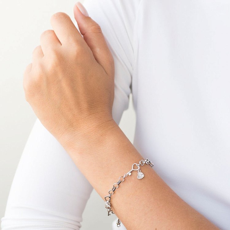 Золотой браслет "Сердечка" с фианитами б03429 от ювелирного магазина Оникс