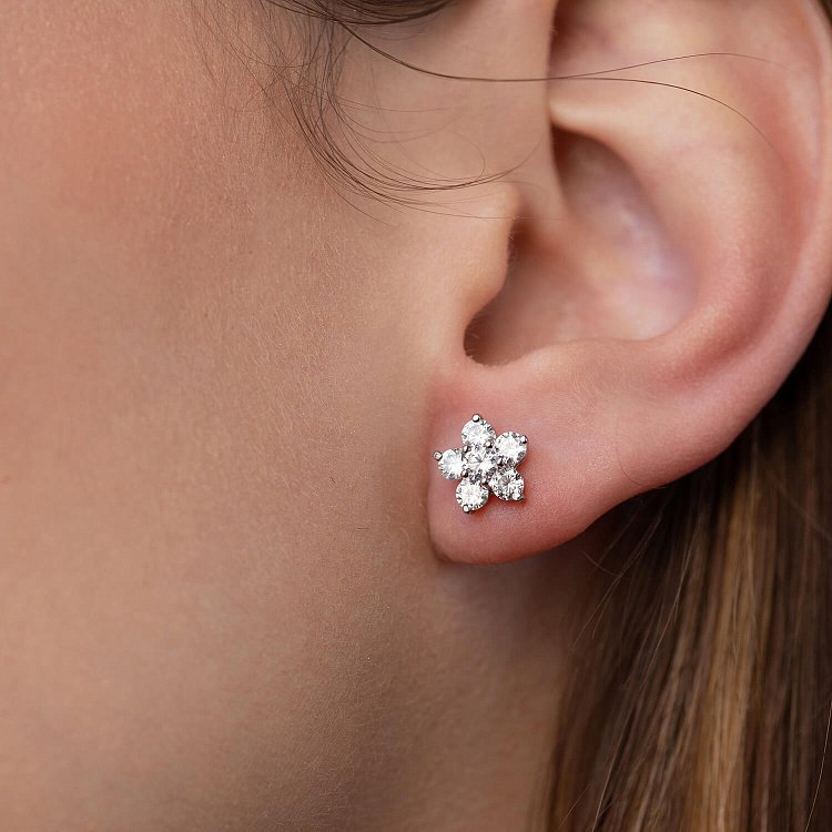 Срібні сережки - пусети "Квіточки" з фіанітами 121482 від ювелірного магазину Онікс