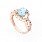Золотое кольцо с голубым топазом и фианитами к04656 от ювелирного магазина Оникс