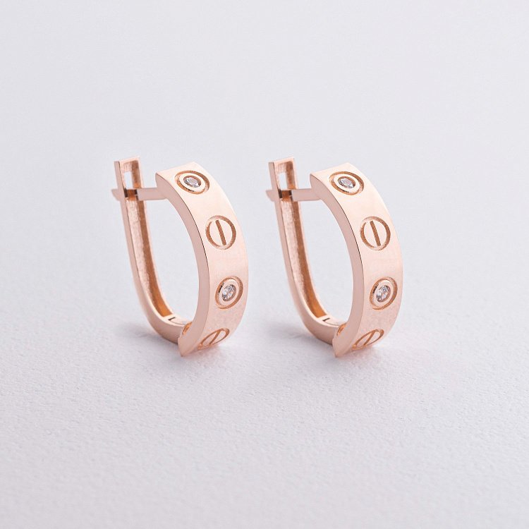 Сережки "Love" з фіанітами (червоне золото) с09315 від ювелірного магазину Онікс