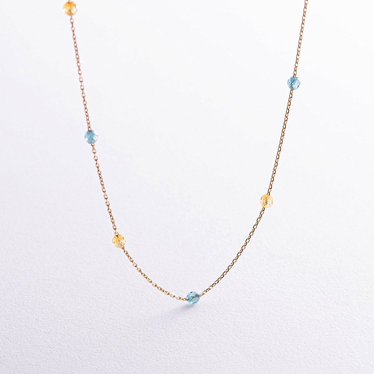 Колье "Free" в желтом золоте (голубые и желтые фианиты) кол02246 от ювелирного магазина Оникс