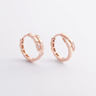 Сережки - кільця "Змії" у червоному золоті (фіаніти) с09455