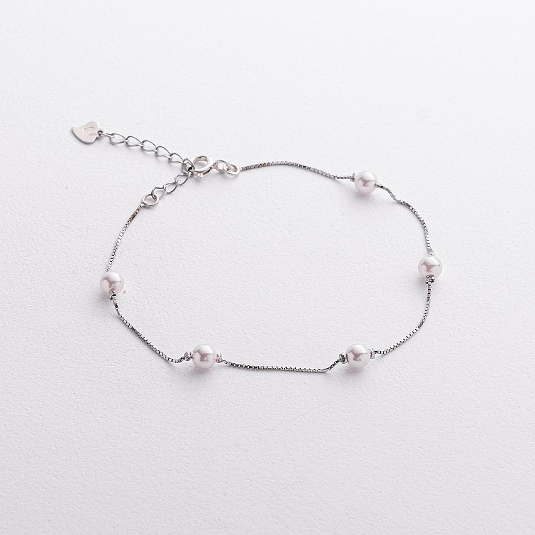 Срібний браслет з перлами 141911 від ювелірного магазину Онікс