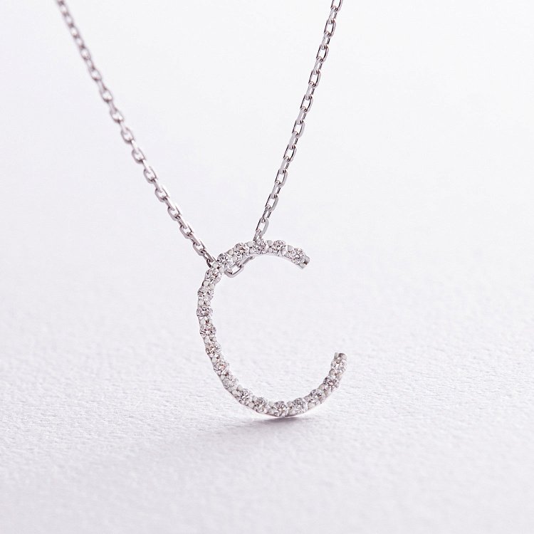 Золоте кольє з літерою "С" з діамантами 133611121 від ювелірного магазину Онікс - 1