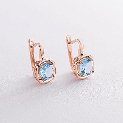 Золотые серьги с голубым топазом с05156