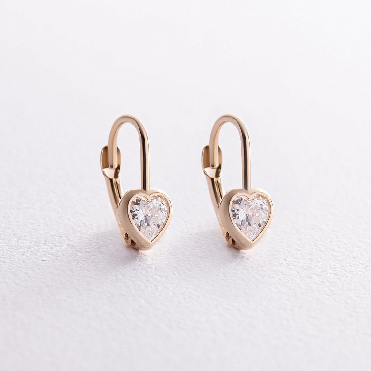Детские золотые серьги "Сердечки" с фианитами с08288 от ювелирного магазина Оникс
