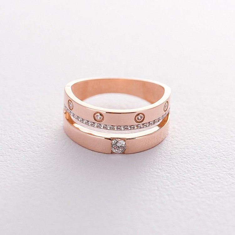 Золотое кольцо с фианитами к04980 Золотое кольцо с фианитами к04980 от ювелирного магазина Оникс