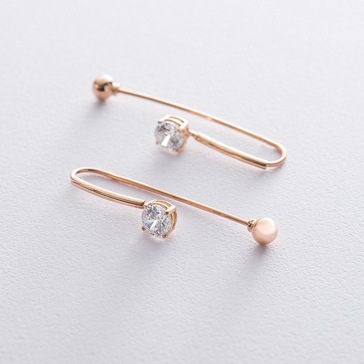 Золотые серьги с фианитами с06189 от ювелирного магазина Оникс