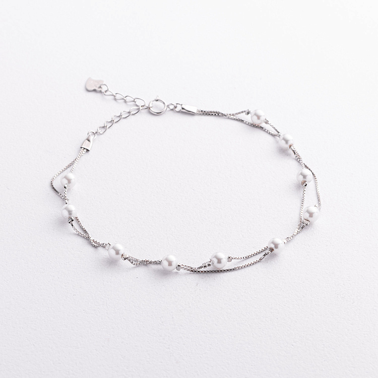 Срібний браслет з перлами 141907 від ювелірного магазину Онікс