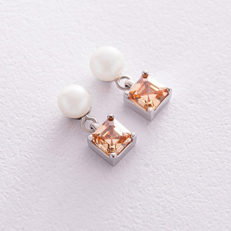 Золоті сережки - пусети "Альма" (помаранчеві фіаніти, перли) с08249 від ювелірного магазину Онікс