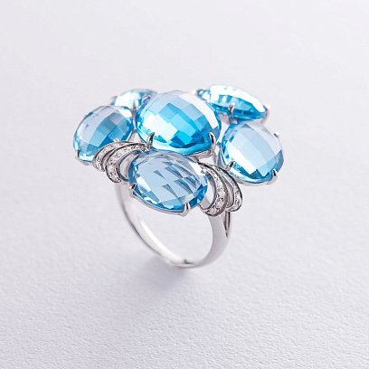 Золота каблучка з діамантами і топазами к1042A1