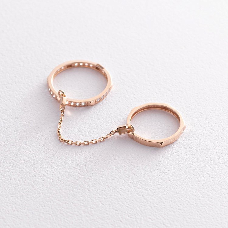 Золота подвійна каблучка з фіанітами к05261 від ювелірного магазину Онікс