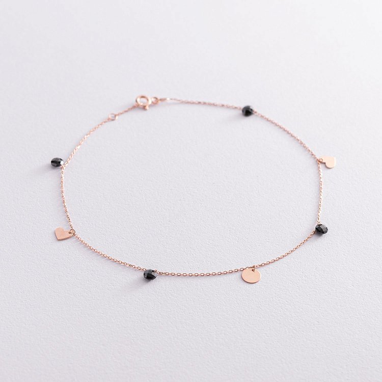 Золотий браслет "Сердечка і монетка" на ногу (чорні фіаніти) б04794 від ювелірного магазину Онікс