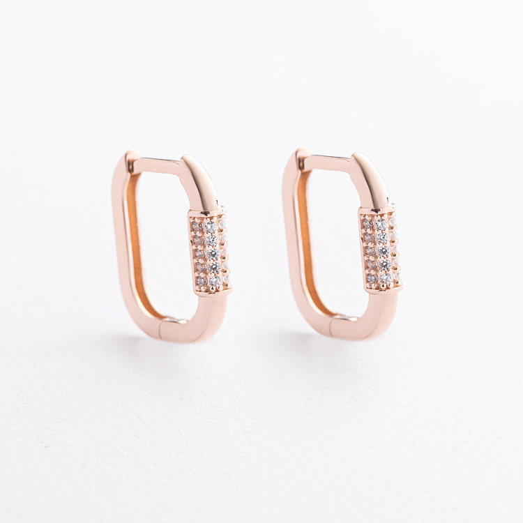 Золоті сережки з фіанітами с09112 від ювелірного магазину Онікс