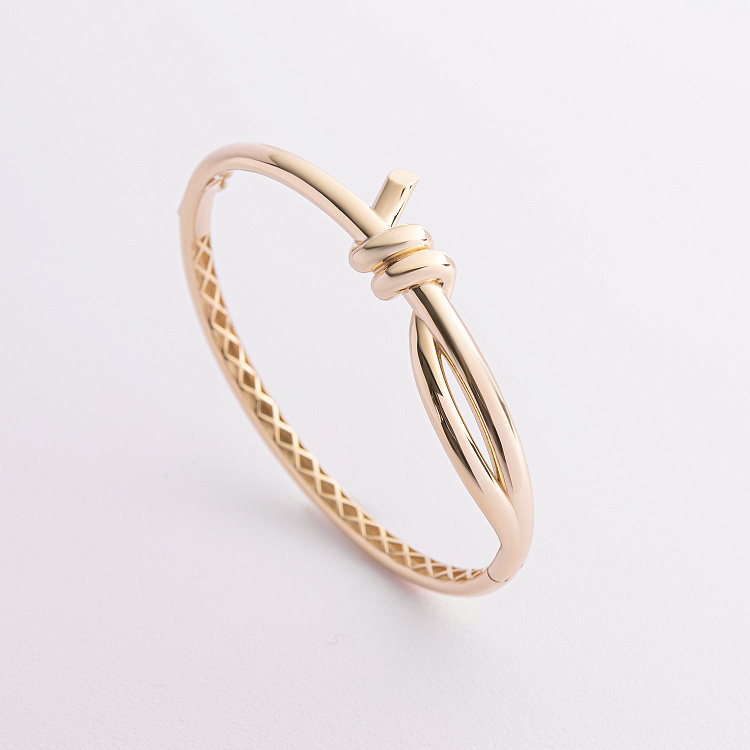 Жорсткий браслет "Brigitte" у жовтому золоті б05743 від ювелірного магазину Онікс