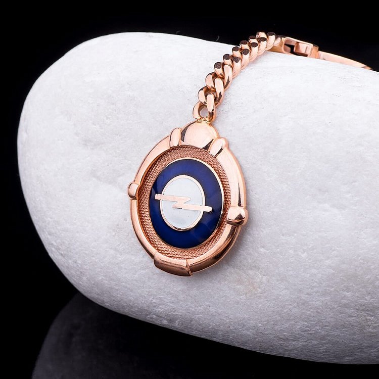 Золотой брелок "Opel-Опель" (эмаль) бр00001o от ювелирного магазина Оникс