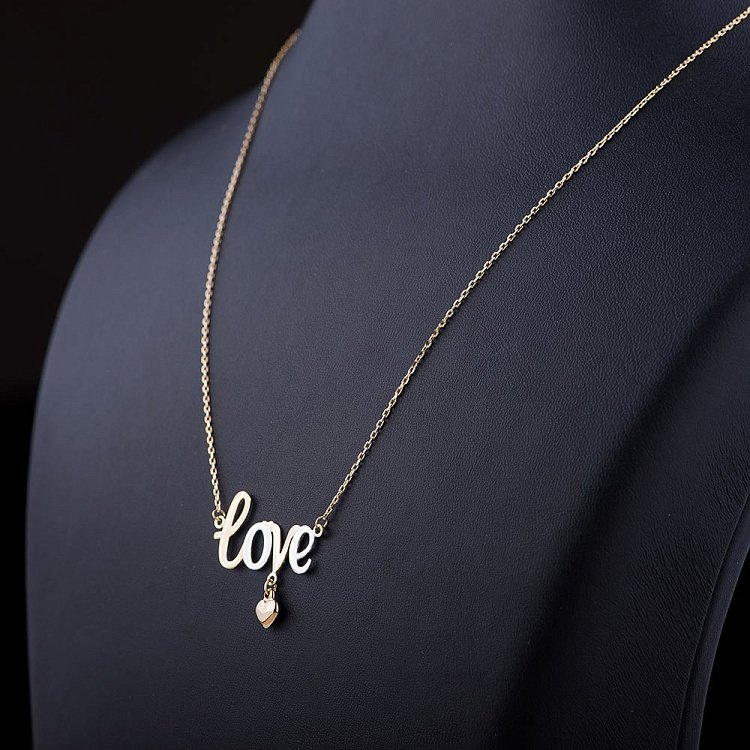 Золотое колье "Love" с сердечком кол01033 от ювелирного магазина Оникс