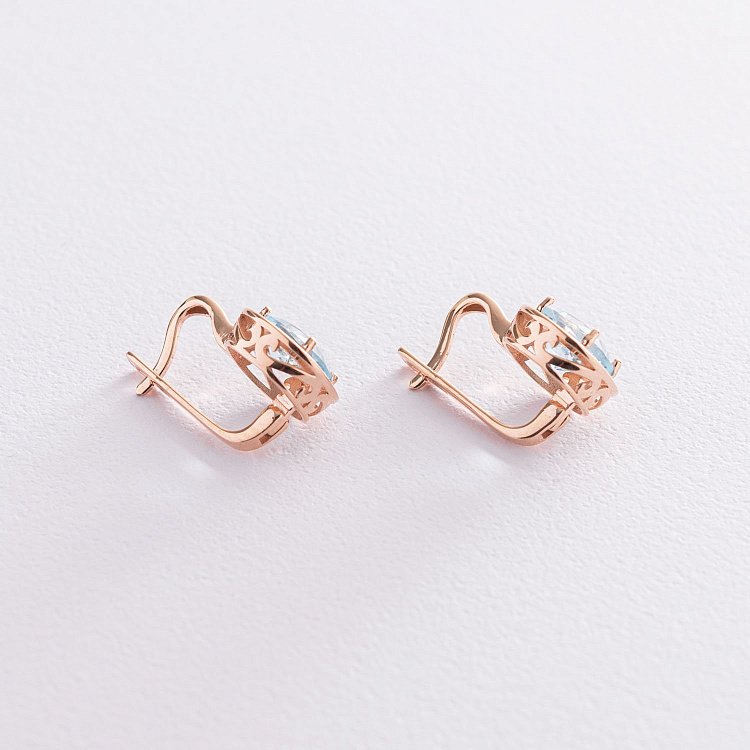 Золотые серьги с голубым топазом с05156 от ювелирного магазина Оникс - 2