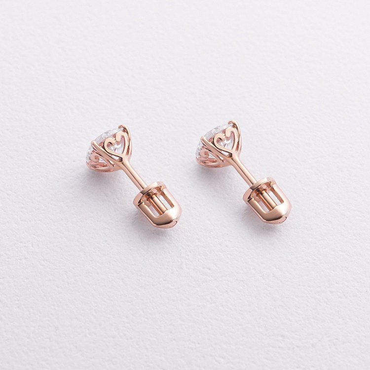 Сережки - пусети "Сердечки" у червоному золоті (фіаніти) с09375 від ювелірного магазину Онікс