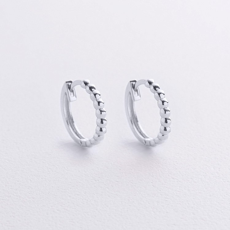 Сережки - кільця в білому золоті (кульки) с09044 від ювелірного магазину Онікс