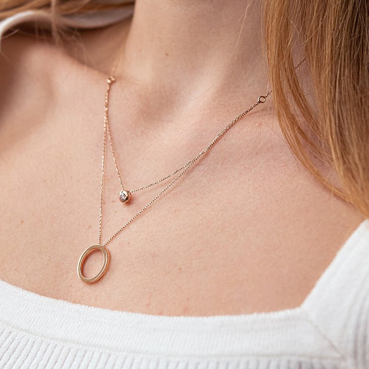 Подвійне кольє "Кругообіг з фіанітом" у червоному золоті кол02107 від ювелірного магазину Онікс - 1