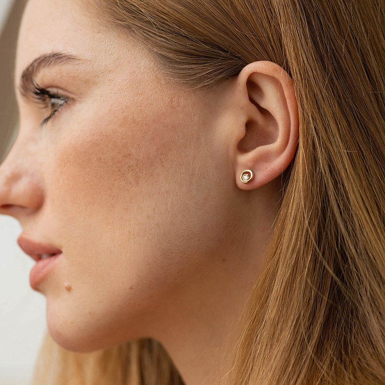 Золотые серьги - пусеты с бриллиантами 36792421 от ювелирного магазина Оникс - 1