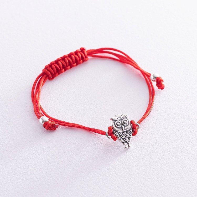 Браслет с красной нитью "Сова" 141114 Браслет с красной нитью "Сова" 141114 от ювелирного магазина Оникс
