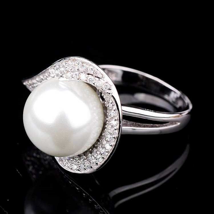 Серебряное кольцо (фианиты, искусственный жемчуг). 111228 от ювелирного магазина Оникс - 1