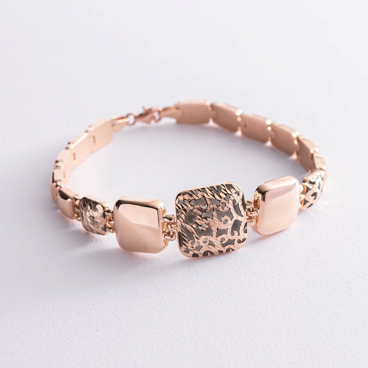 Золотой браслет с черной эмалью б04077 от ювелирного магазина Оникс