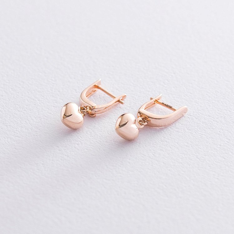 Золоті сережки "Сердечка" с06864 від ювелірного магазину Онікс