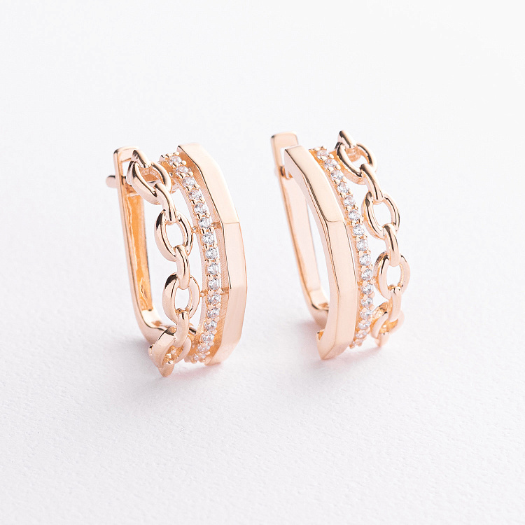 Золоті сережки "Ланцюжки" з фіанітами с09017 від ювелірного магазину Онікс