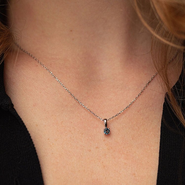 Золотая подвеска с топазом "Лондон голубой" пб0083gl от ювелирного магазина Оникс - 1