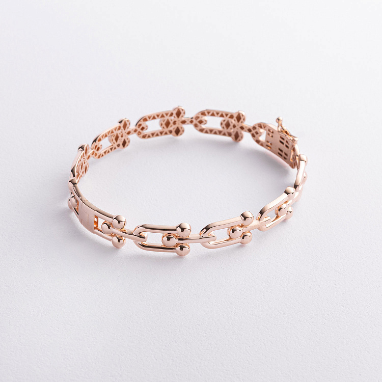 Жорсткий браслет "Фантазія" у червоному золоті б05836 від ювелірного магазину Онікс - 1