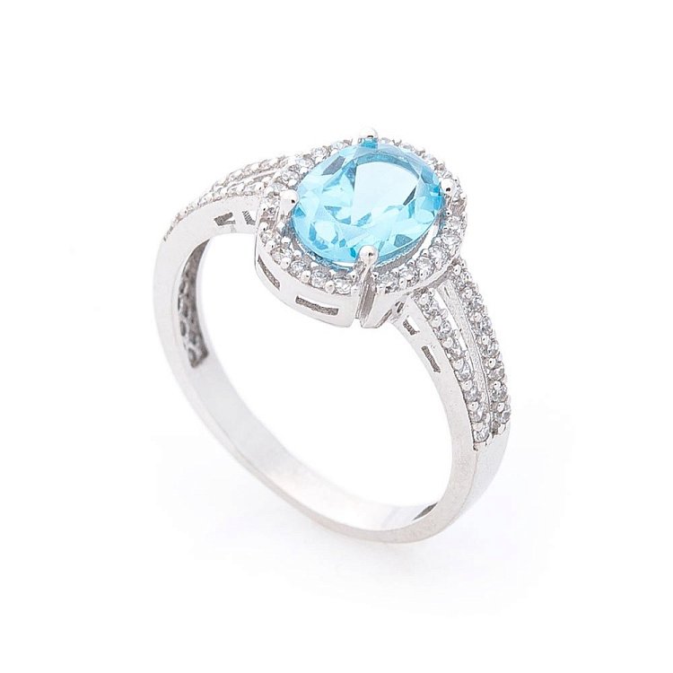 Золотое кольцо с голубым топазом и фианитами к05074 от ювелирного магазина Оникс