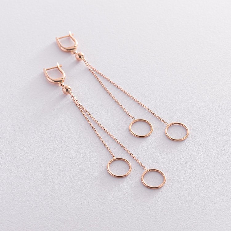 Золотые серьги "Круговорот на цепочке" с07339 от ювелирного магазина Оникс